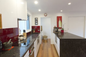 kitchen renovation-waterfall end-built in micro wave-dish drawer-spotted gum-feature floor-polished floor-1