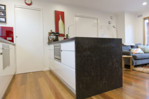 kitchen renovation-waterfall end-built in micro wave-dish drawer-spotted gum-feature floor-polished floor