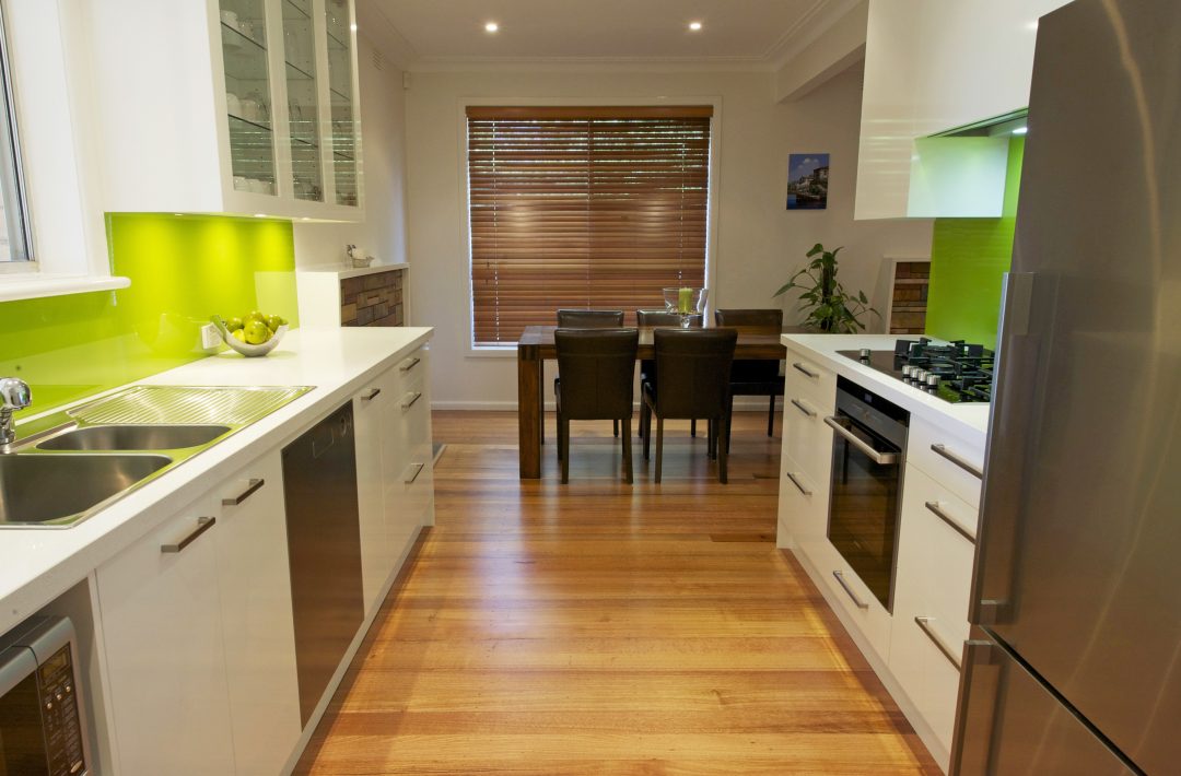 Galley Kitchen-Meals Area-Narrow Room-White Cabinets-White Bench Tops